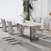 Modern minimalist dining table. Imitation marble glass sticker desktop, stainless steel legs, stable and beautiful. 4 premium PU seats