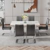Modern minimalist dining table. Imitation marble glass sticker desktop, stainless steel legs, stable and beautiful. 6 premium PU seats.